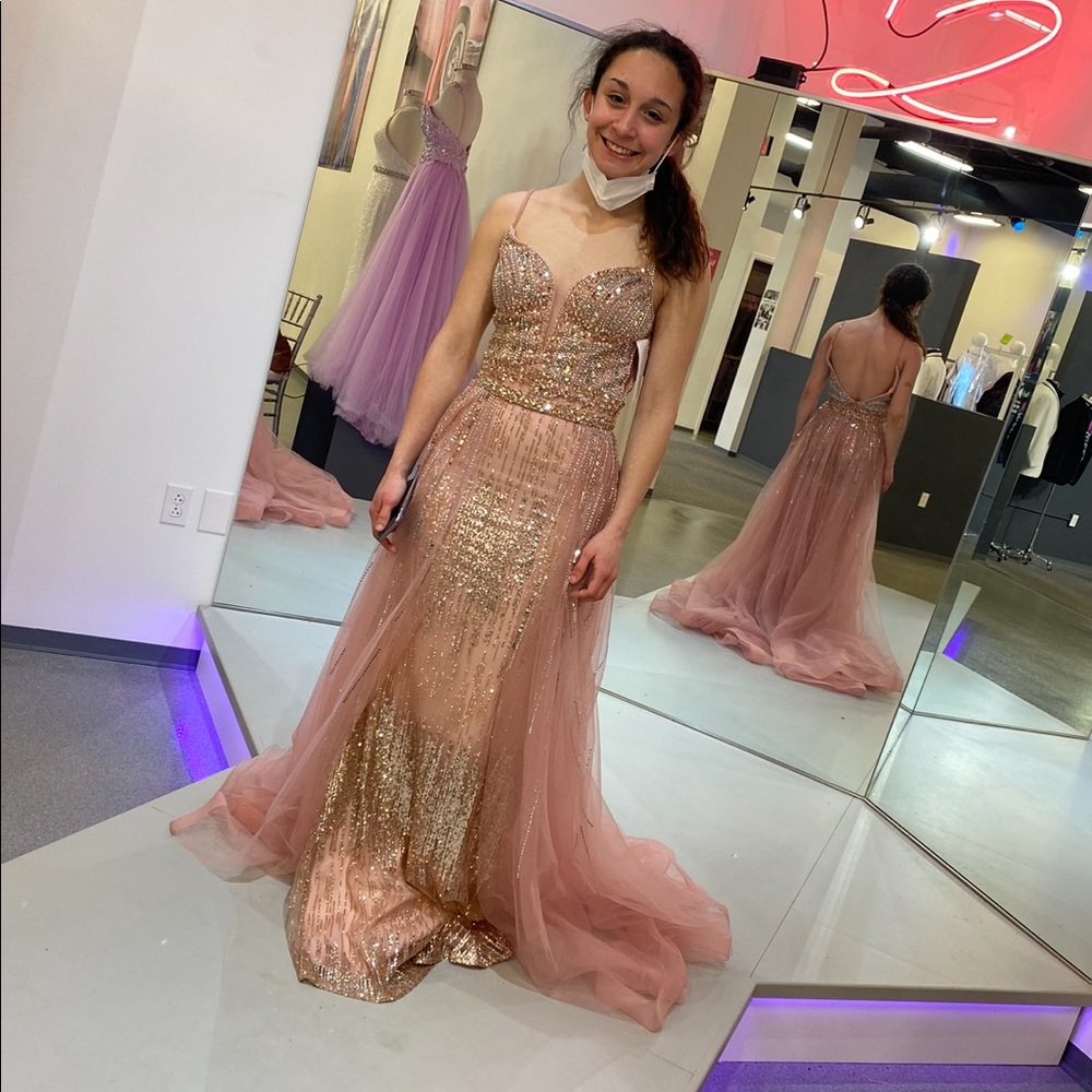 jovani 
light pink with removable train
size 2
